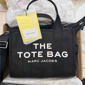 Marc Jacob’s black canvas The Tote Bag